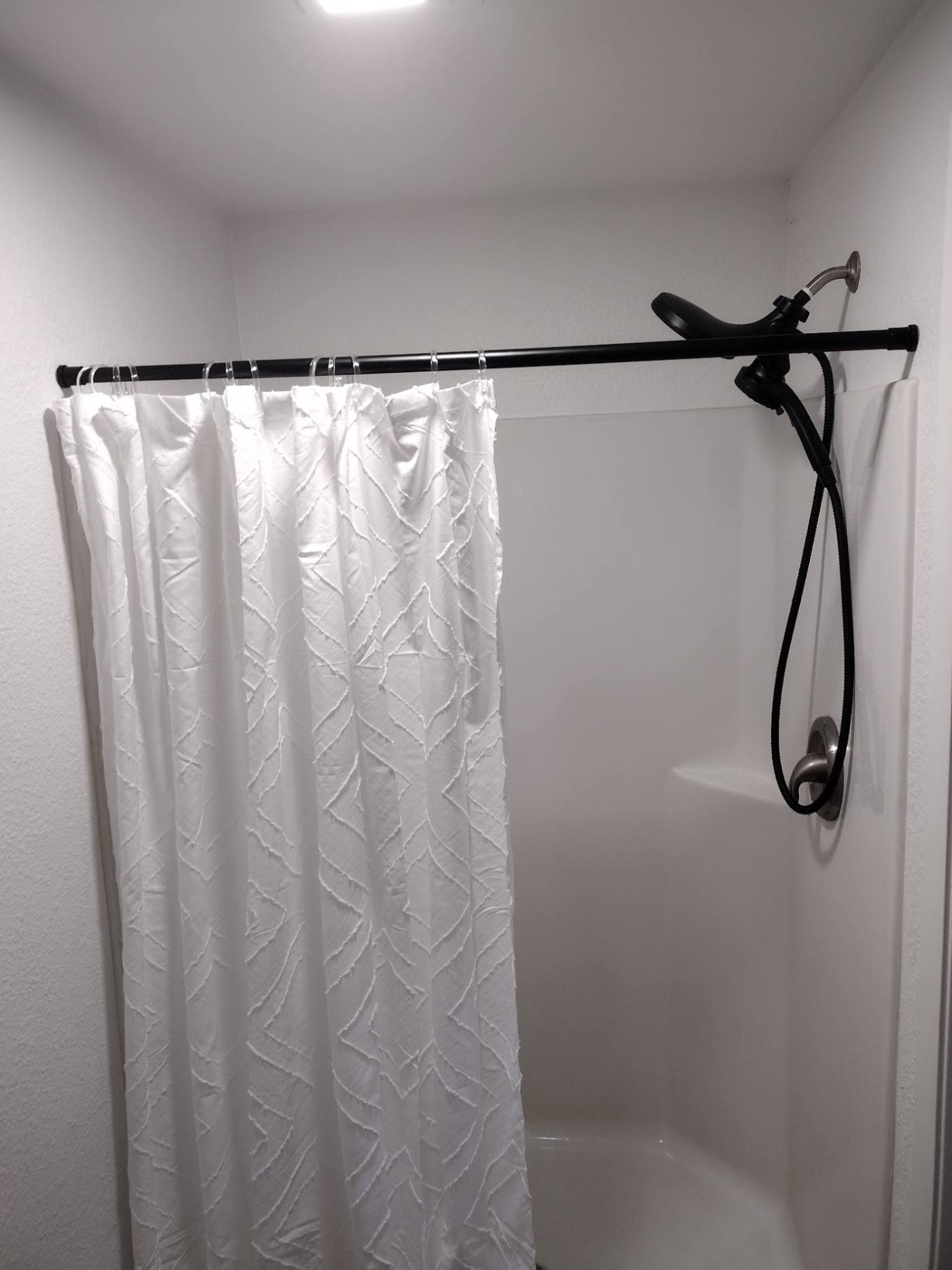 Shower and tub in a dome unit bathroom at The Domain, Aransas Pass
