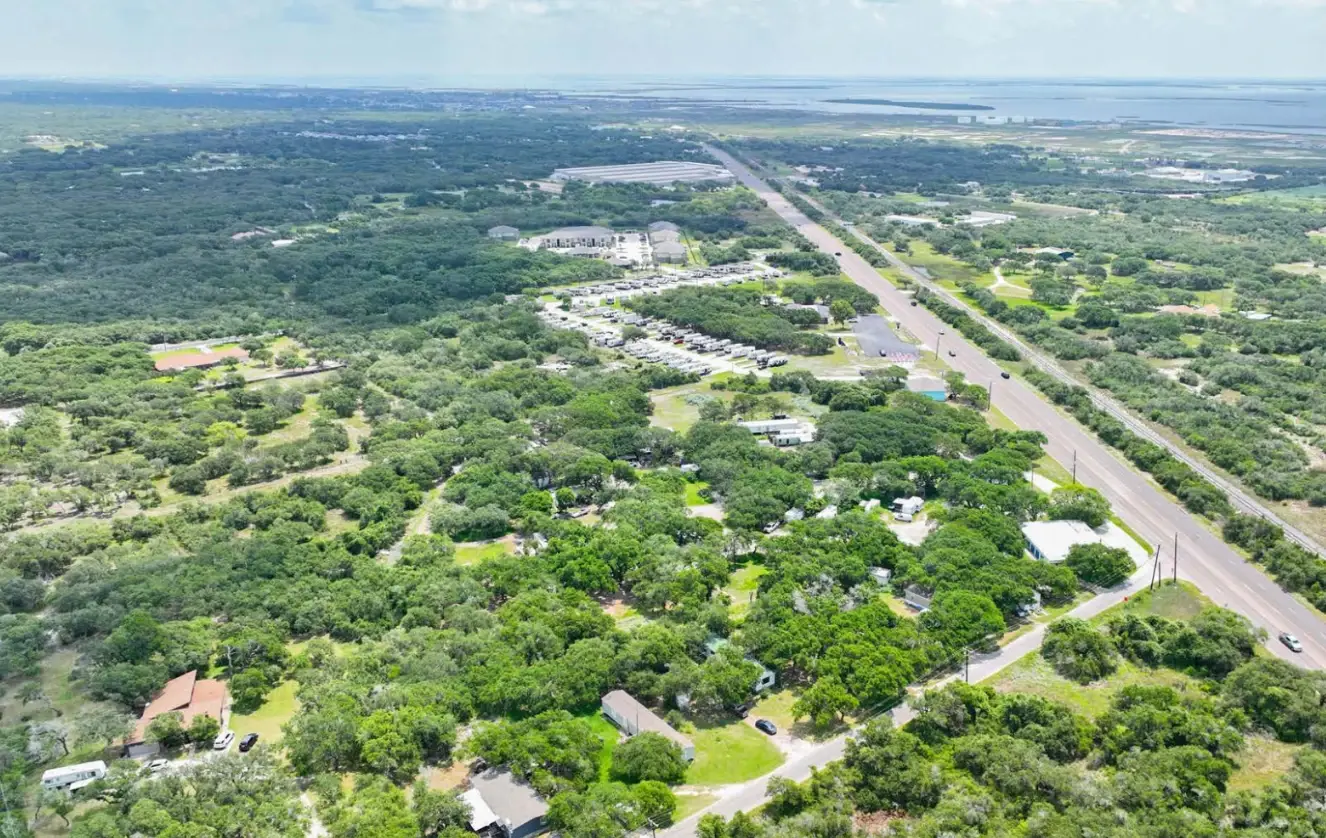 Aerial of Indian Trails RV Park with Highway 361 and the Coastal Bend beyond